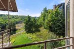 Private balcony provides a mountain view